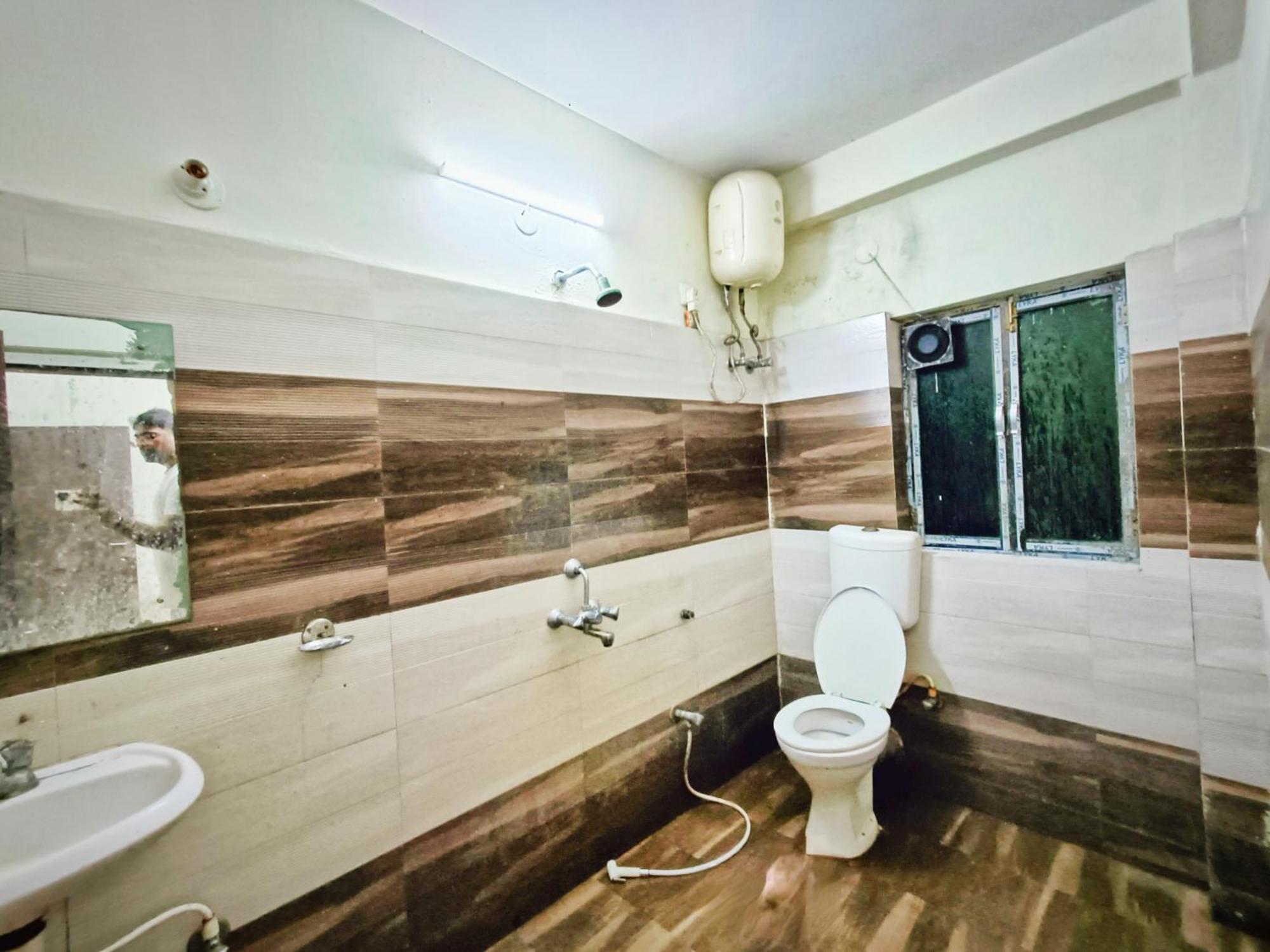 Rest Inn Hotel Newtown Road Near Tata Medical Калькутта Номер фото